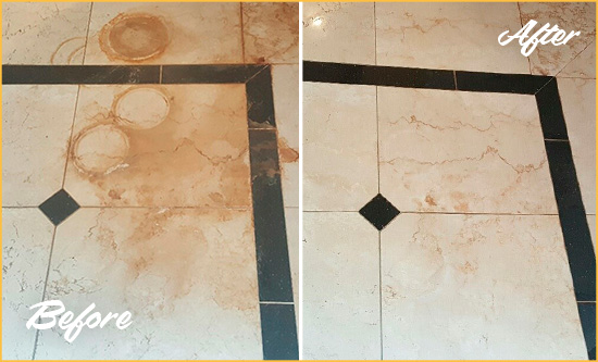 Before and After Picture of a Ridgefield Hard Surface Restoration Service on a Marble Floor to Eliminate Rust Stains